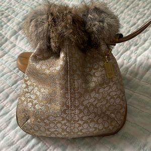 Beautiful Gold Signature Coach Wristlet